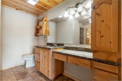 This meticulous, custom log home is high quality in design - photo 24