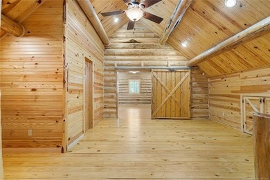 This meticulous, custom log home is high quality in design - photo 33