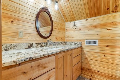 This meticulous, custom log home is high quality in design - photo 34