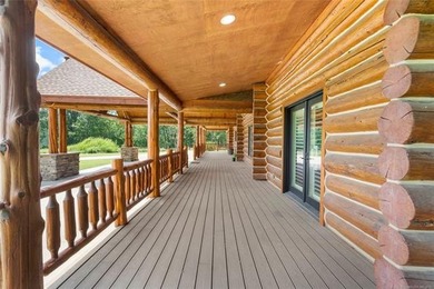 This meticulous, custom log home is high quality in design - photo 38