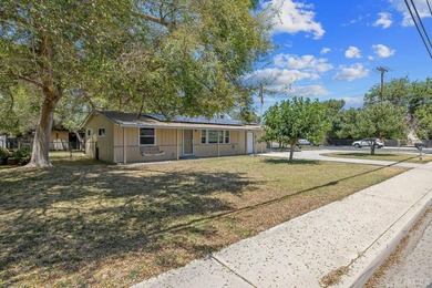 This charming cornerlot property blends comfort, functionality - photo 3