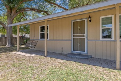 This charming cornerlot property blends comfort, functionality - photo 4