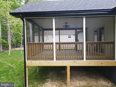 Nestled in the prestigious Lake of the Woods community, this - photo 11