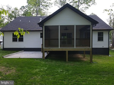 Nestled in the prestigious Lake of the Woods community, this - photo 12