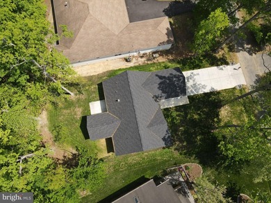 Nestled in the prestigious Lake of the Woods community, this - photo 16