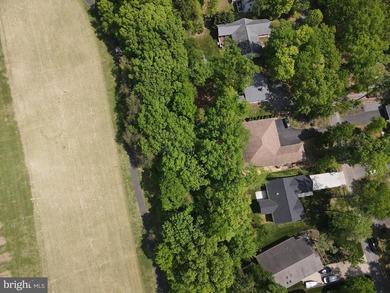 Nestled in the prestigious Lake of the Woods community, this - photo 17