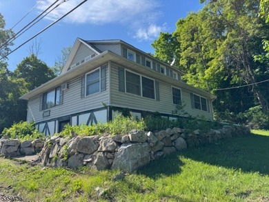 2 family home plus a room used for storage. Great rents! Newer - photo 1
