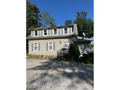 2 family home plus a room used for storage. Great rents! Newer - photo 2