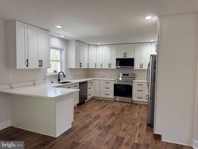 Nestled in the prestigious Lake of the Woods community, this - photo 22
