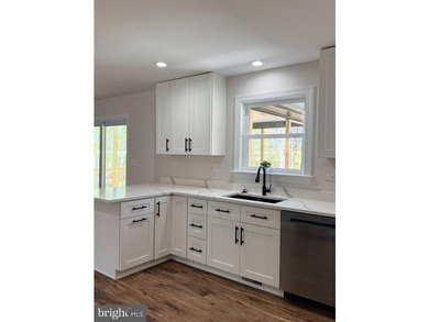 Nestled in the prestigious Lake of the Woods community, this - photo 23