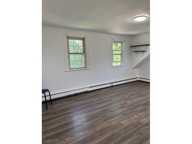 2 family home plus a room used for storage. Great rents! Newer - photo 6