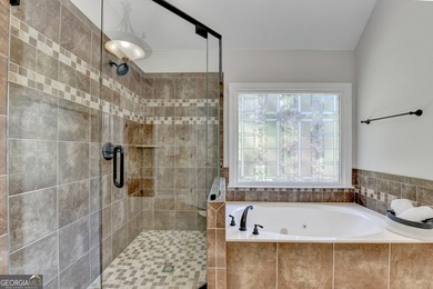 Welcome to this stunning 5-bedroom, 5 full bath home located in - photo 47