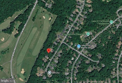 Nestled in the prestigious Lake of the Woods community, this - photo 49
