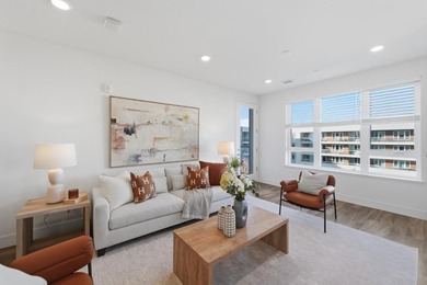 Welcome to 5933 Sunstone Dr #410, a modern luxury condo with 2