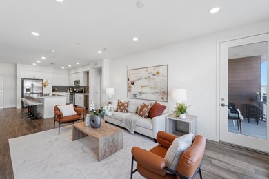 Welcome to 5933 Sunstone Dr #410, a modern luxury condo with 2