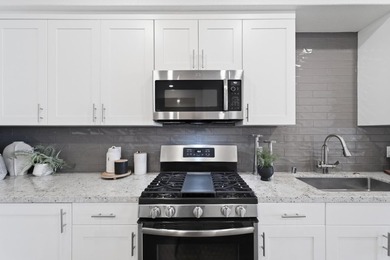 Welcome to 5933 Sunstone Dr #410, a modern luxury condo with 2