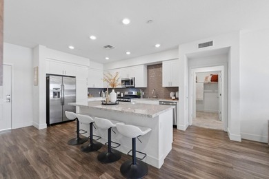 Welcome to 5933 Sunstone Dr #410, a modern luxury condo with 2