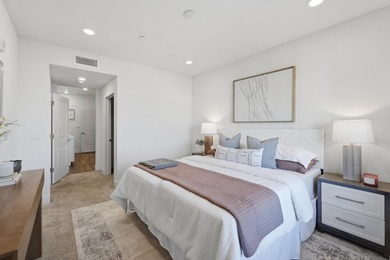 Welcome to 5933 Sunstone Dr #410, a modern luxury condo with 2