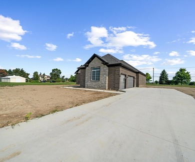 The ''Joshua'' ranch style home w/upgraded 3-car attached garage - photo 1