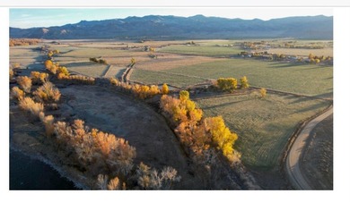 Large 97.5 acre parcel in Challis with Salmon River adjacency - photo 2