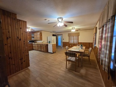 A rare find in Mena - a rustic home on 5 beautiful acres with - photo 32