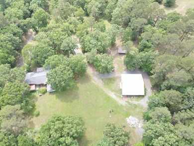 A rare find in Mena - a rustic home on 5 beautiful acres with - photo 48