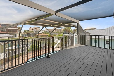 This charming 3-bedroom, 2-bathroom island-style waterfront home - photo 22
