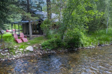 RARE - grandfathered just steps from Warm Springs Creek with an - photo 1