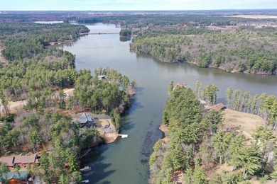 Lot 16, a buildable wooded lot on Nepco Lake, Central Wis. Build - photo 15