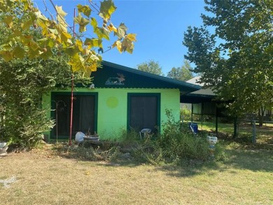 LOOKING FOR A LAKE RETREAT? This 3 bed 2 bath home has - Lake Home Sale Pending in Stigler, Oklahoma