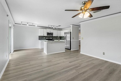 Welcome to 3260 Commodore Court, a beautifully renovated lake - photo 6