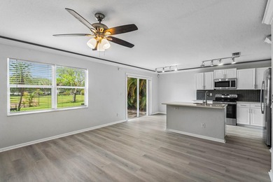 Welcome to 3260 Commodore Court, a beautifully renovated lake - photo 7