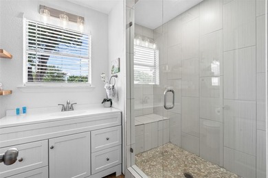 Step into lake life with this stylishly updated getaway on the - photo 15