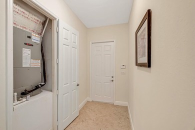 This lake front coach home has a brand-new roof, new AC with - photo 6