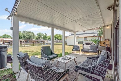 Step into lake life with this stylishly updated getaway on the - photo 17