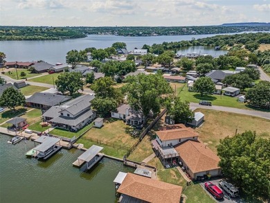 Step into lake life with this stylishly updated getaway on the - photo 25