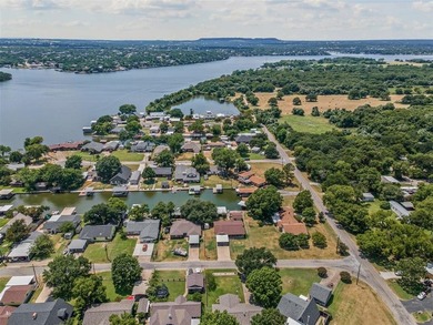 Step into lake life with this stylishly updated getaway on the - photo 29
