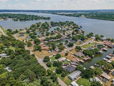 Step into lake life with this stylishly updated getaway on the - photo 30