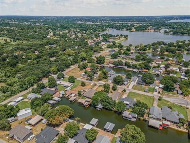 Step into lake life with this stylishly updated getaway on the - photo 32