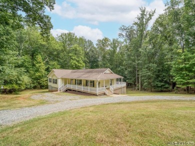 SANDY BEACH in MERIFIELD ACRES with a deep water DOCK enjoying - Lake Home For Sale in Clarksville, Virginia