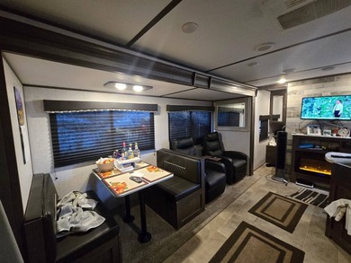Motivated Seller! Charming 2-bedroom, 1-bath camper with a large - photo 12
