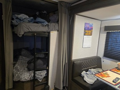 Motivated Seller! Charming 2-bedroom, 1-bath camper with a large - photo 13