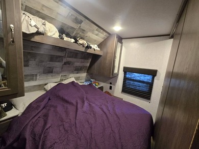 Motivated Seller! Charming 2-bedroom, 1-bath camper with a large - photo 16