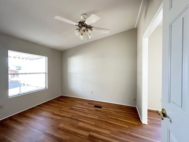 This well-maintained Palm Harbor multi-section manufactured home