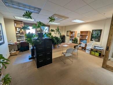 Elegant wood-paneled common area atrium, shared conference room - photo 2