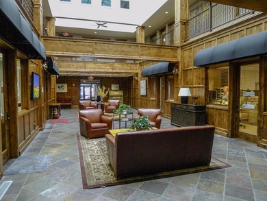 Elegant wood-paneled common area atrium, shared conference room - photo 7