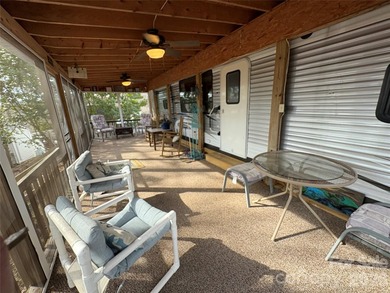 Back on the market and ready for summer at Badin Lake! Whether - photo 2