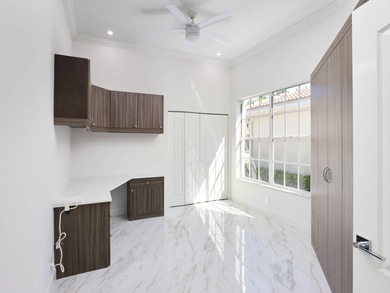 This completely reimagined 3-bedroom, 2-bath residence offers a - photo 11