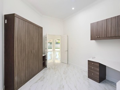This completely reimagined 3-bedroom, 2-bath residence offers a - photo 13