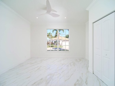 This completely reimagined 3-bedroom, 2-bath residence offers a - photo 14